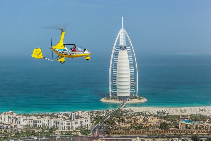 Soar above Dubai's stunning coastline and iconic landmarks soaking in breathtaking views while cruising in a gyrocopter. Experience the city like never before with an unforgettable airborne adventure.